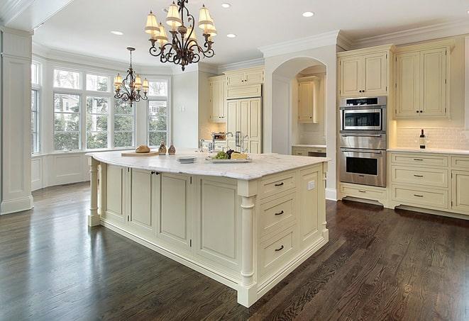 a modern kitchen with newly installed laminate flooring in Whites Creek